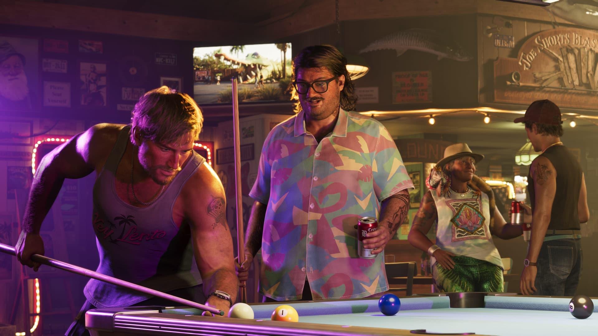 A man bent over a pool table in a pink-lit bar while three others watch