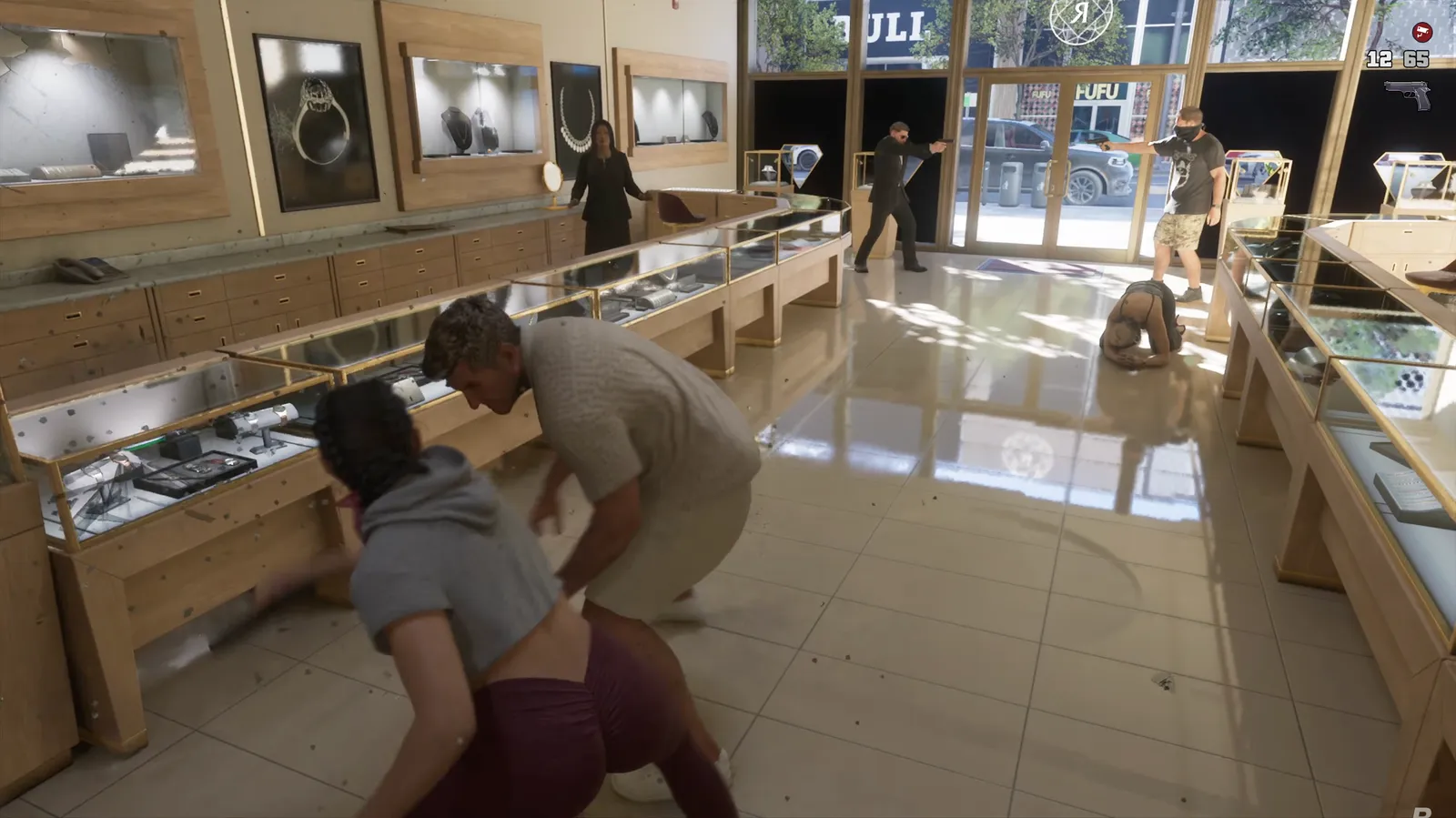 Masked robber aiming a pistol near the glass doors of a jewelry store while a customer crouches on the tiled floor in GTA 6 preview footage