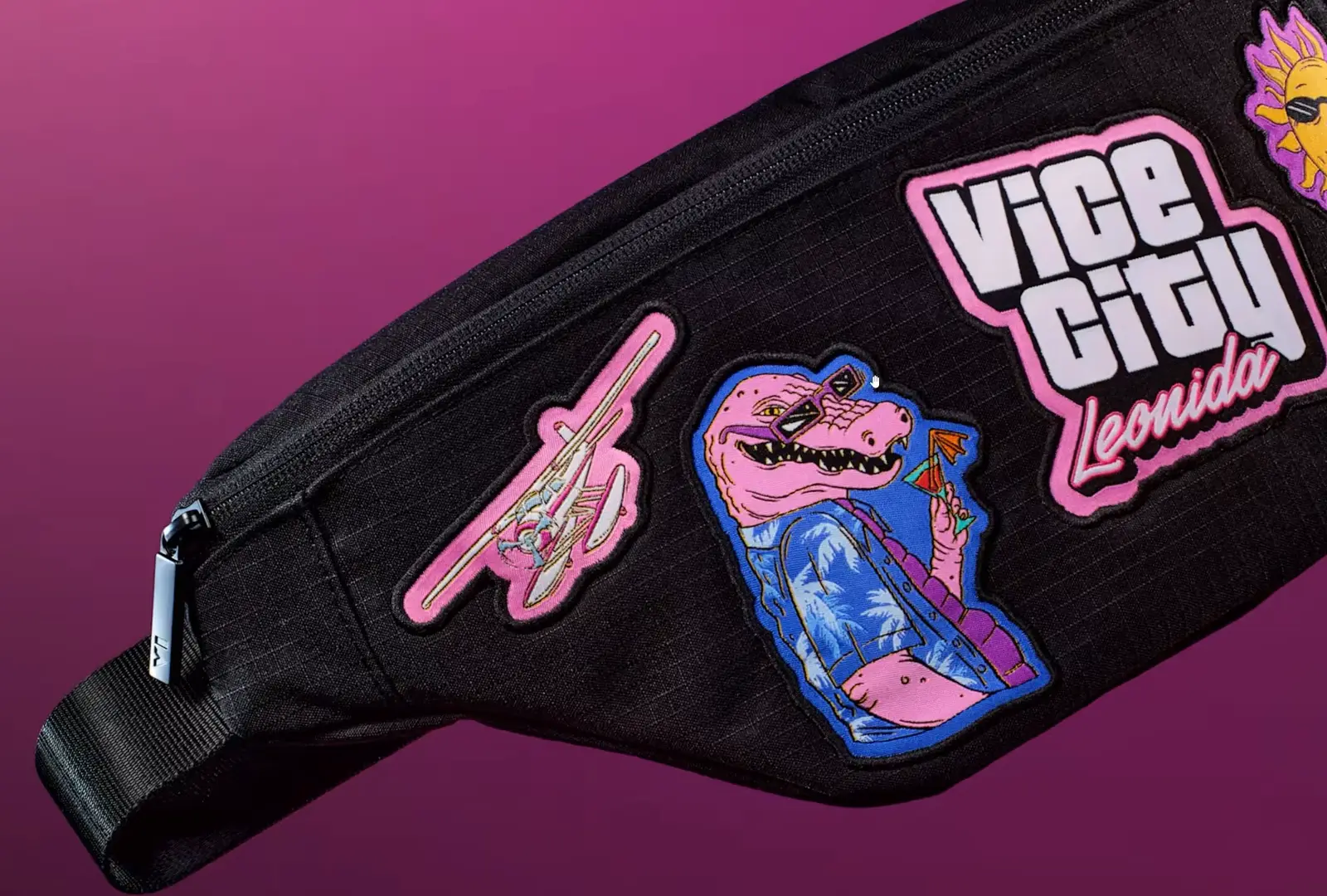 GTA 6 collector’s edition Leonida Keys crossbody bag with a seaplane patch, a Macca the Gator patch and a Vice City Leonida logo patch