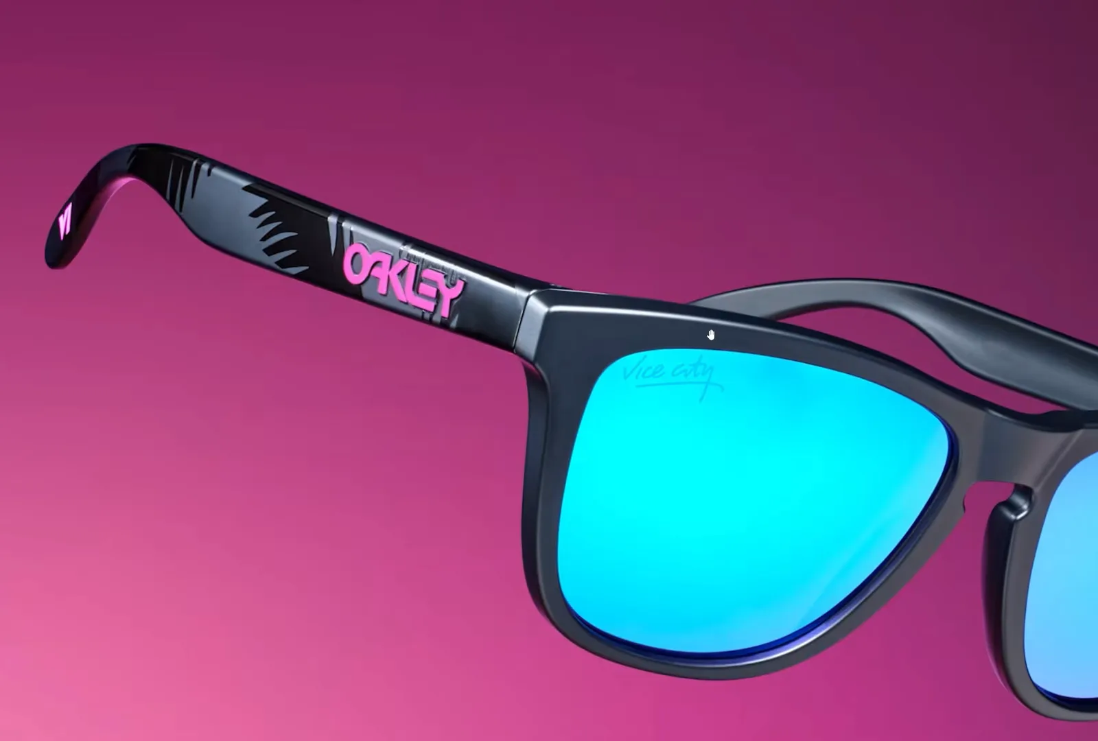 GTA 6 collector’s edition matte black Oakley Frogskins sunglasses with blue Prizm Sapphire lenses and a pink Vice City logo etched on the lens