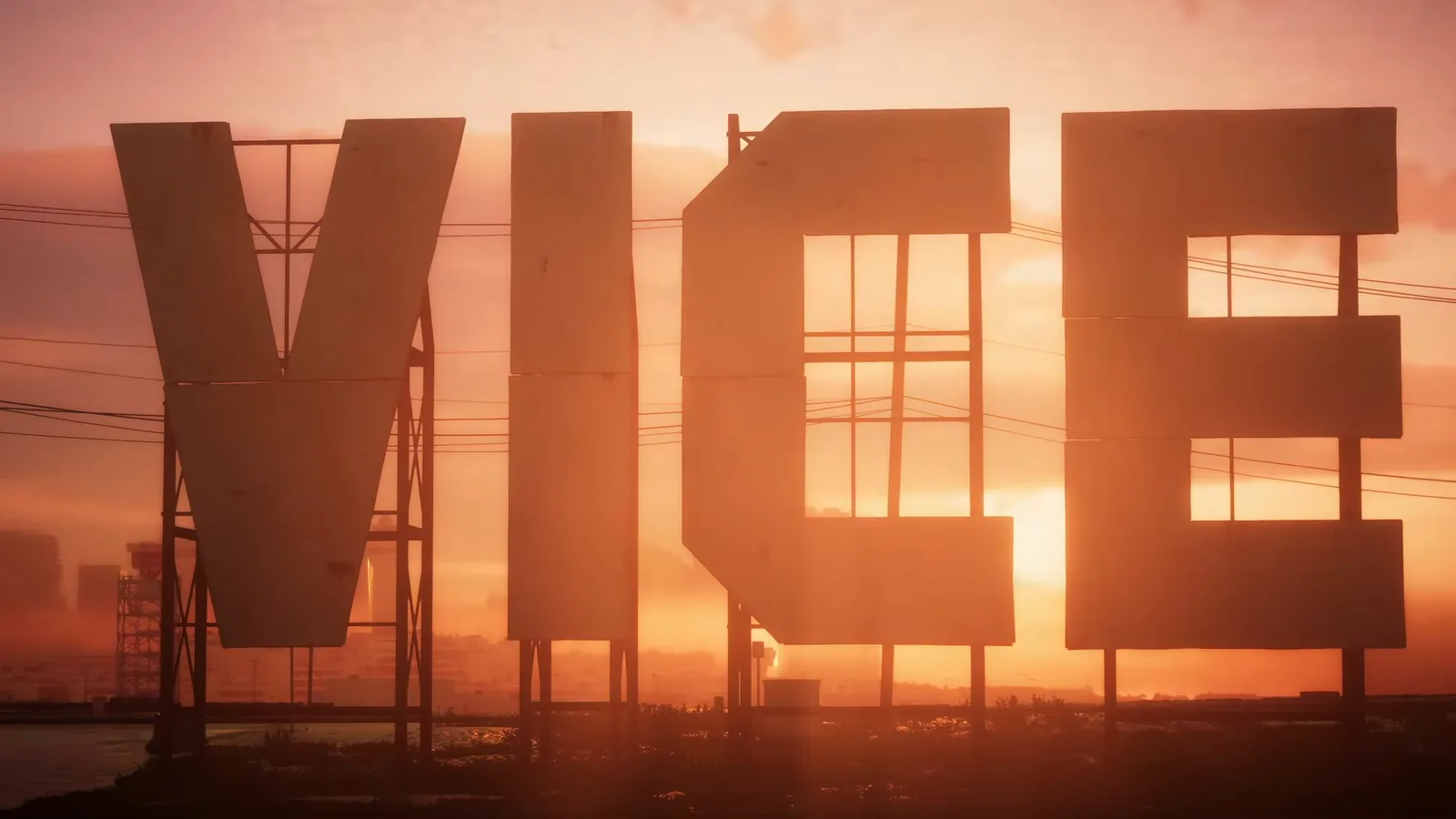 Giant hillside sign spelling VICE in block letters against an orange sunset sky in GTA 6