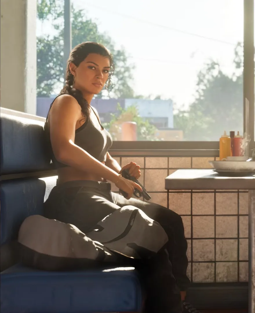 Lucia in a diner booth holding a pistol with a bag on the seat beside her in a new GTA 6 screenshot