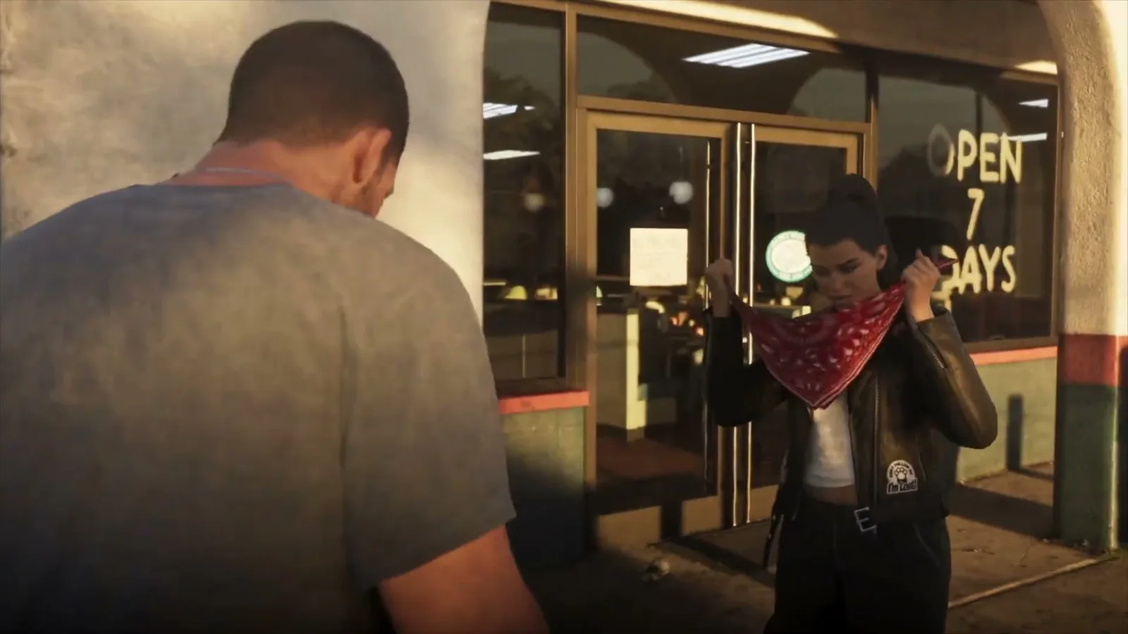 GTA 6 Lucia tying a red bandana over her face outside a store with an Open 7 Days sign in the Extended Look trailer