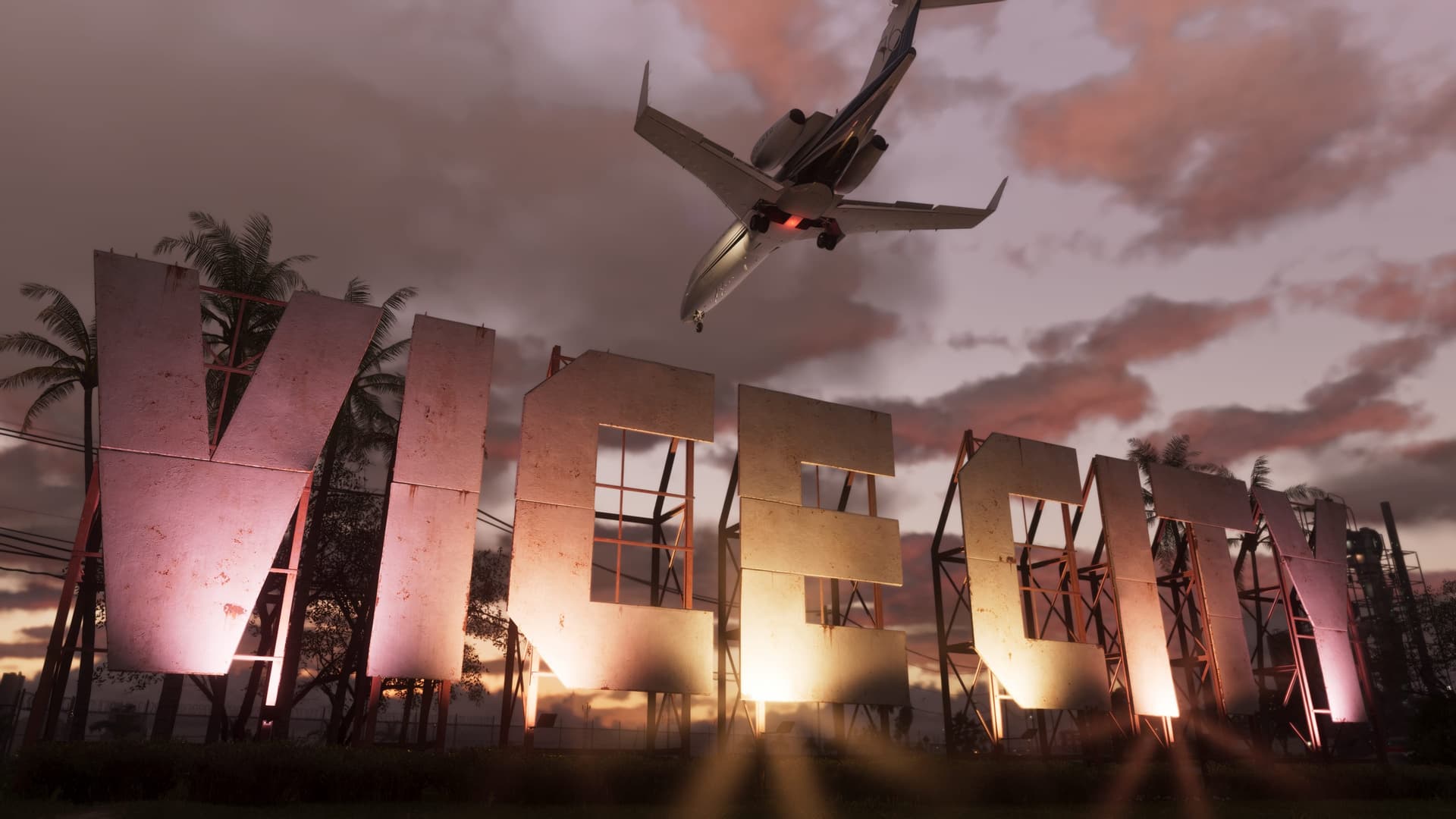 Vice City sign lettered in large stone-effect capitals at dusk with a jet banking overhead in an official GTA 6 screenshot